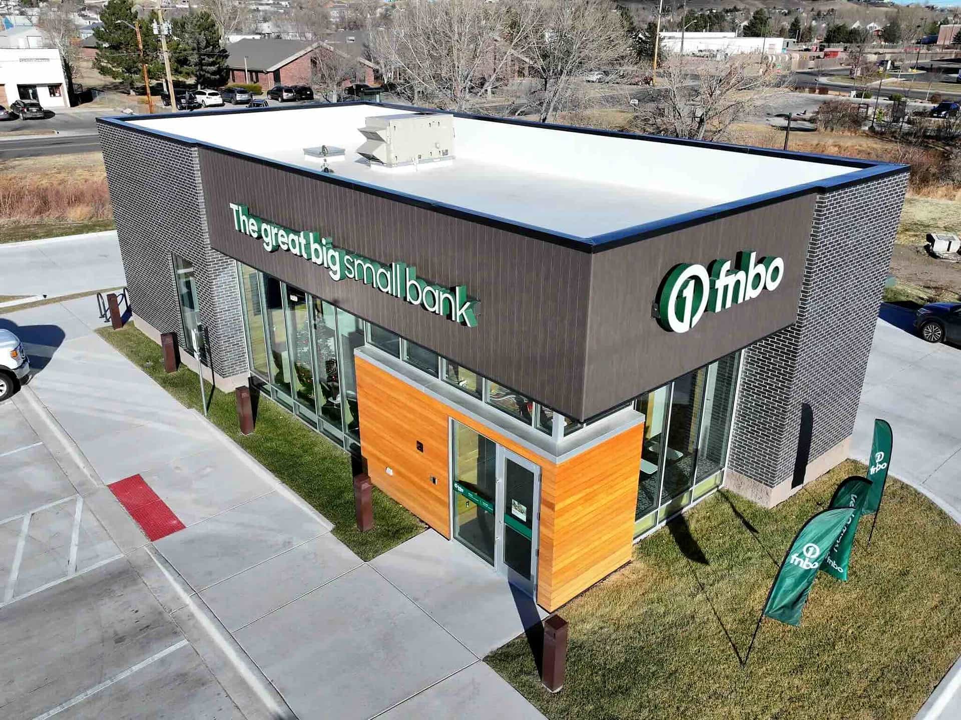 Aerial view of a completed commercial TPO roof on the FNBO bank building in Denver, Colorado