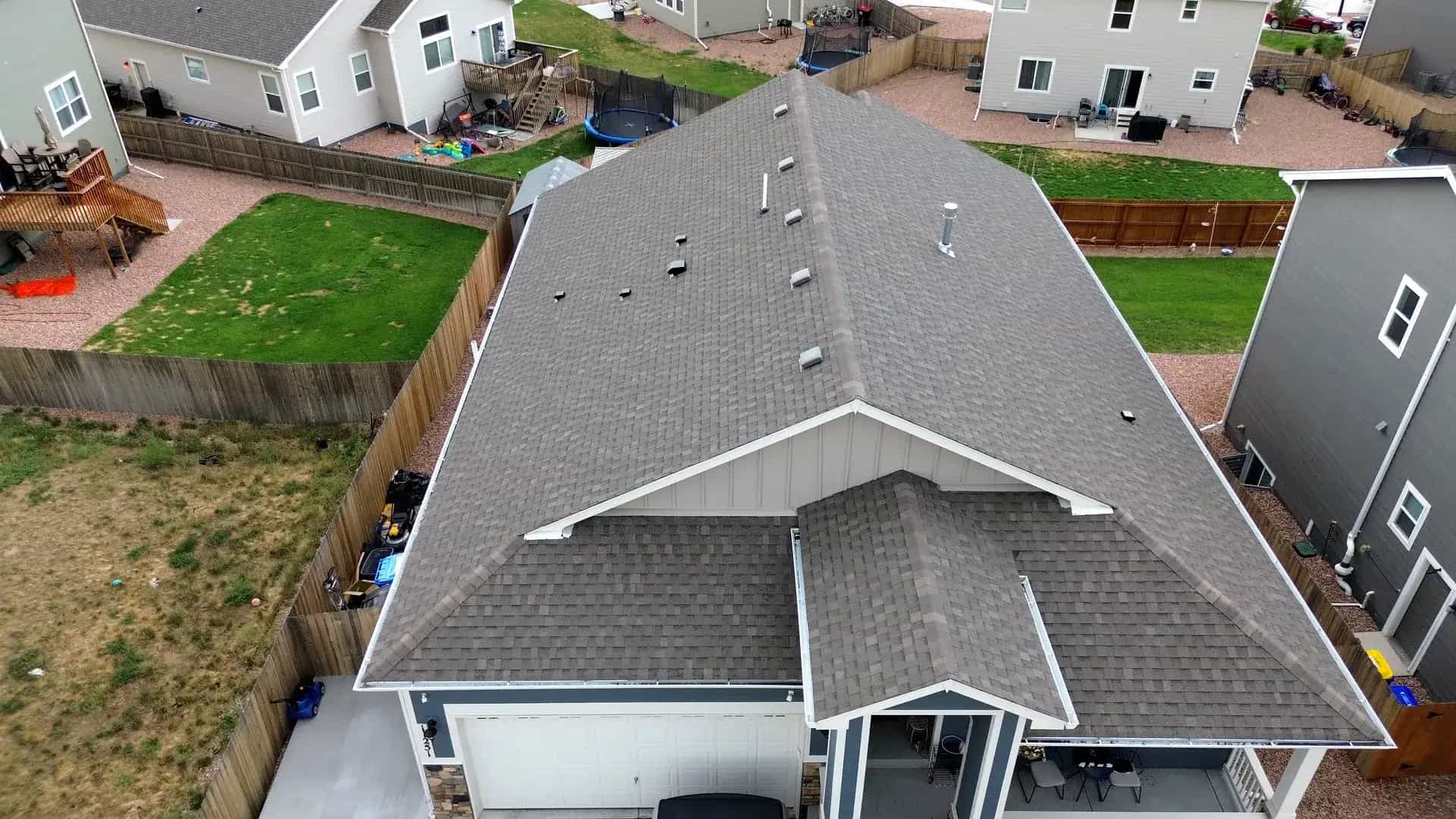 Aerial view of a completed architectural asphalt shingle roof on a home in Colorado Springs, Colorado